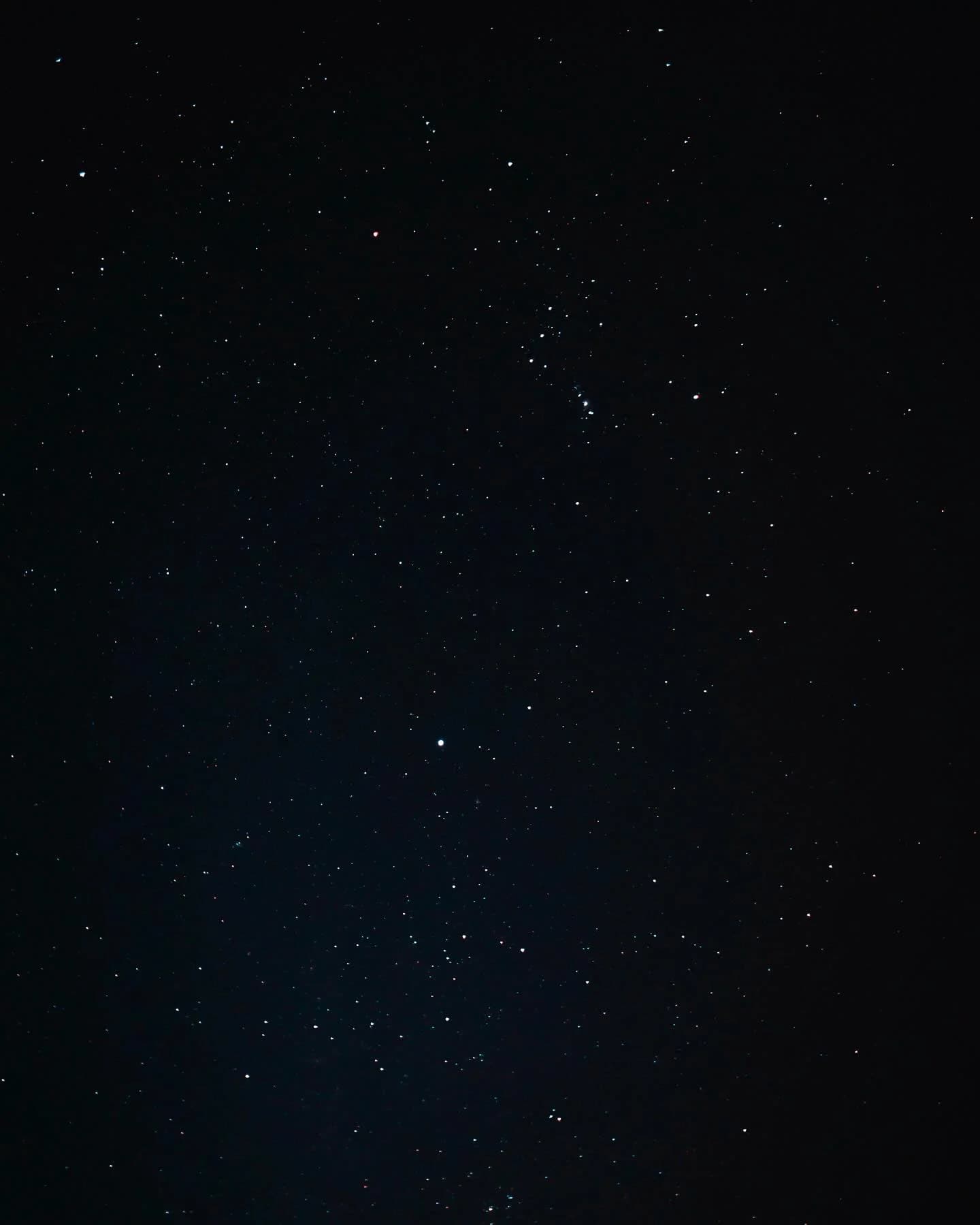 Dense field of stars against a black sky