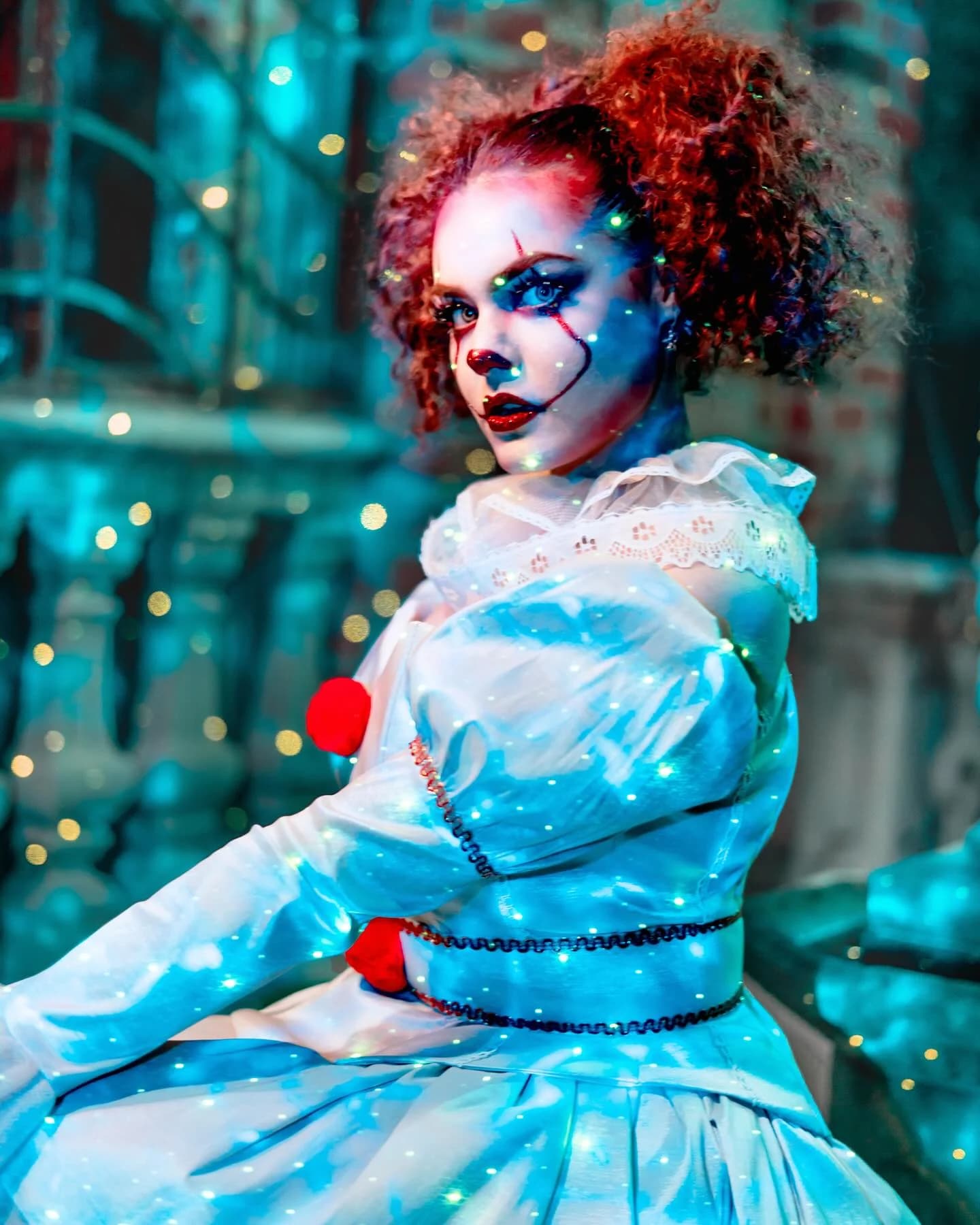 Theatrical harlequin portrait covered in projected points of light